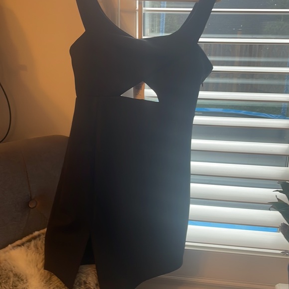 black mini dress with front and back cutouts. - Picture 4 of 5